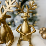Gold Sitting Holding Hands Reindeer